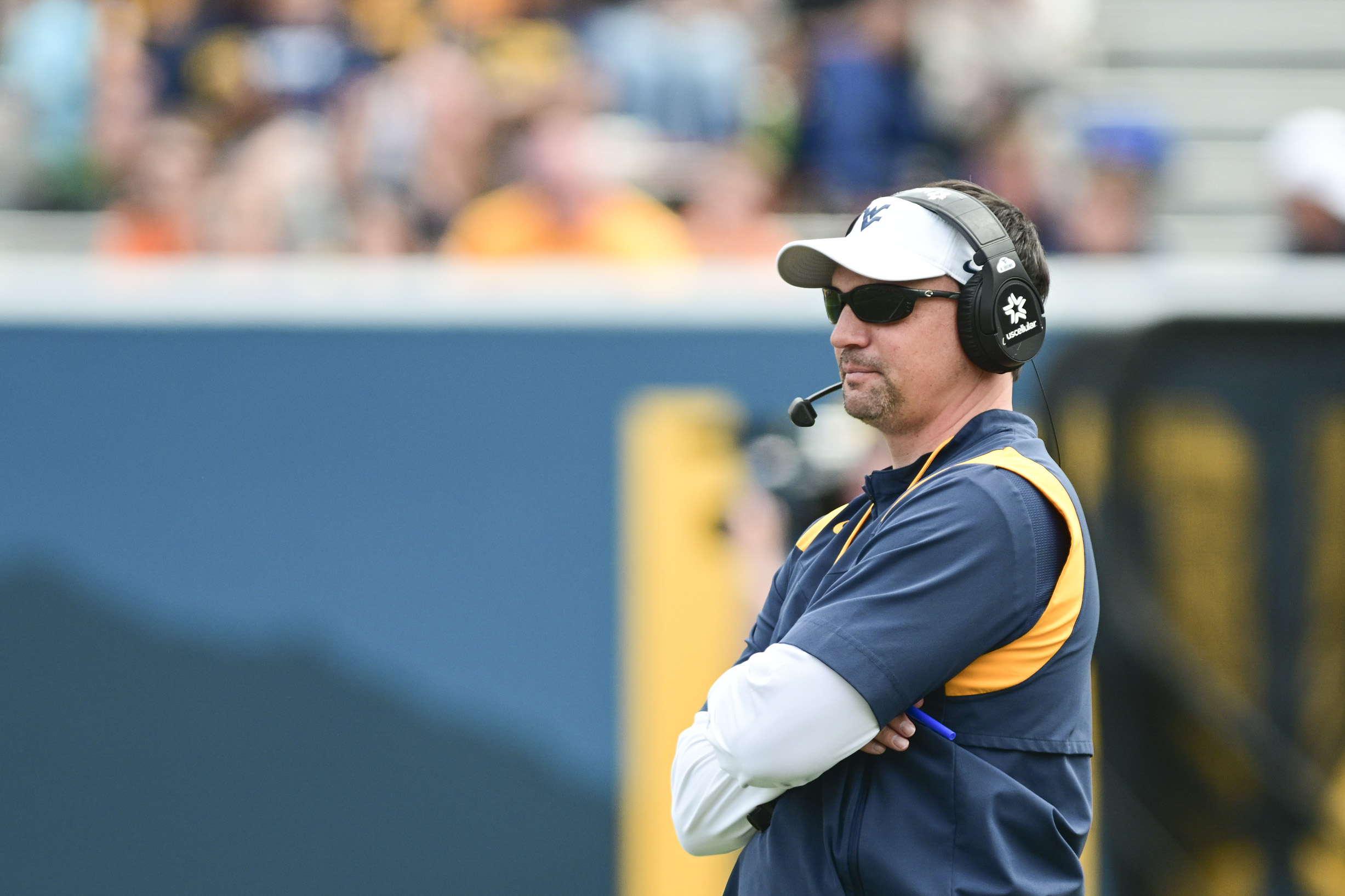 Rich Rodriguez defends former West Virginia football coach Neal Brown